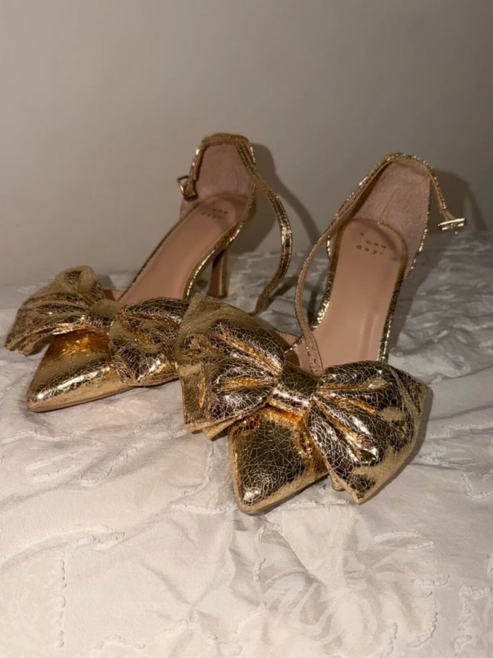 Gold bow heels